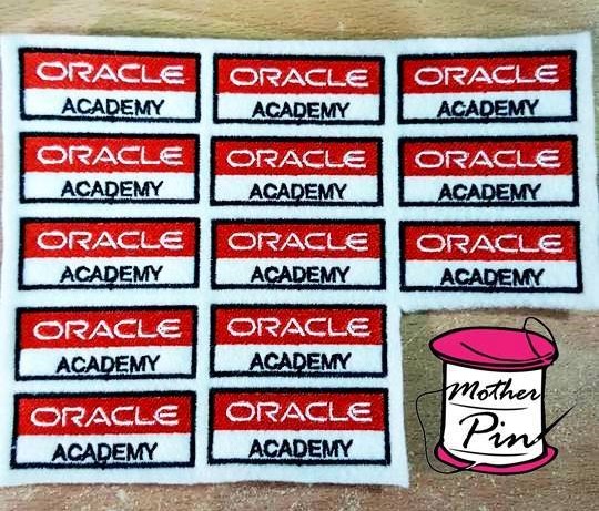 งานปักอาร์ม Oracle