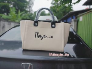 ผลงานกระเป๋าปักดาว