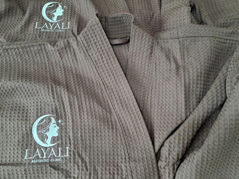 ปักชุดคลุมคลินิค